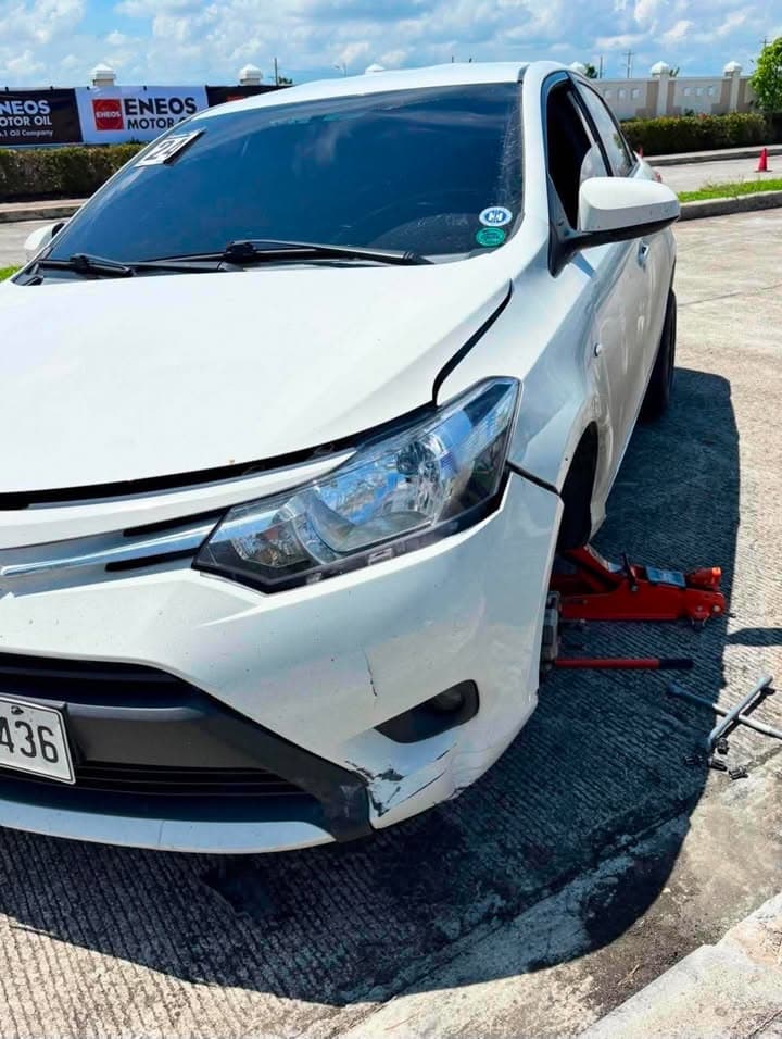 DLC Vios after an autocross accident with its damaged front wheel removed
