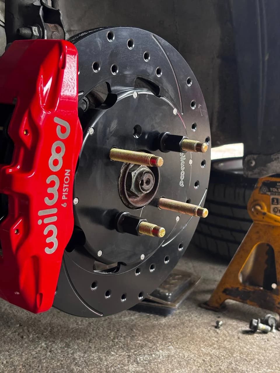 Honda Brio extended wheel studs sample installation with the wheel removed